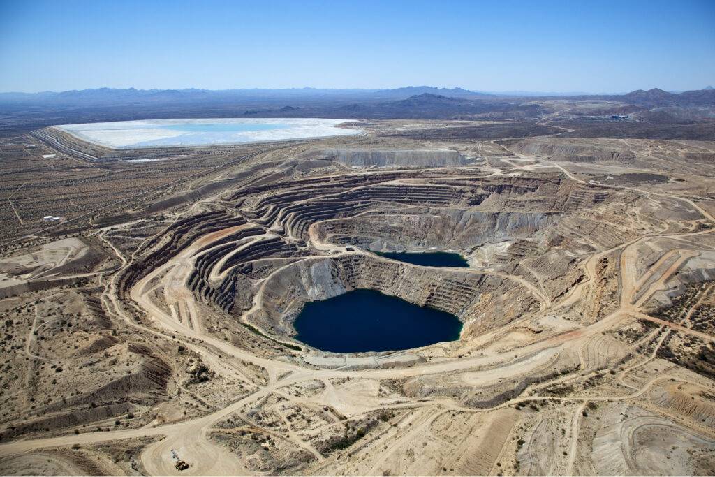 An example of an open pit copper mine with large tailings facilities.